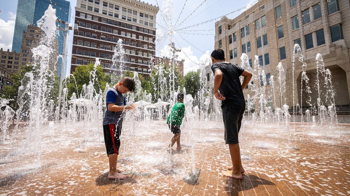 Children play in the fountains at the Sundance Square plaza in downtown Fort Worth on Wednesday, July 24, 2024. Children play in the fountains at the Sundance Square plaza in downtown Fort Worth on Wednesday, July 24, 2024.